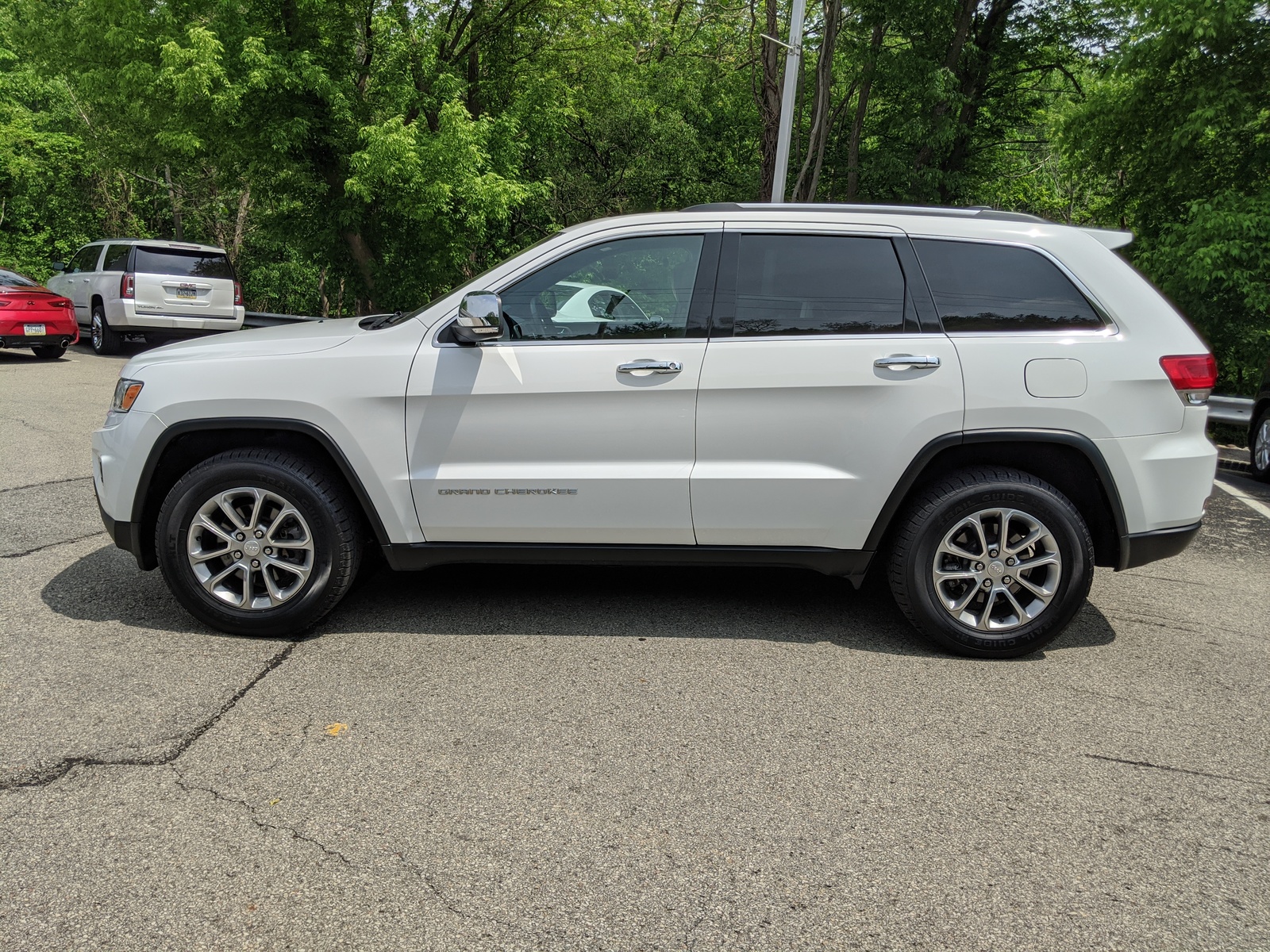 Pre Owned 2015 Jeep Grand Cherokee Limited in Bright White Clearcoat 