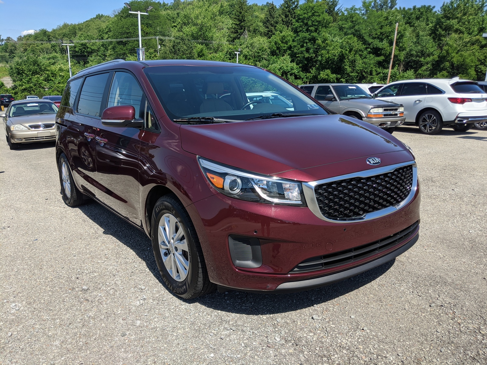 Certified Pre-Owned 2016 Kia Sedona LX in Venetian Red Pearl Metallic